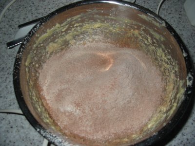 sift in flour and cocoa powder