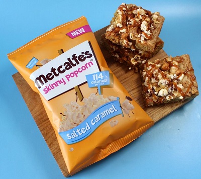 Salted caramel popcorn blondies and bag of Metcalfe's salted caramel popcorn