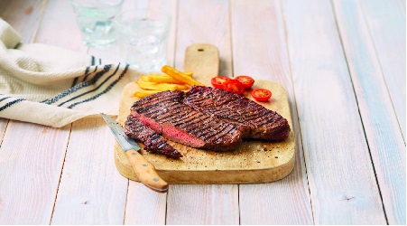 aldi steak on a board cooked to perfection